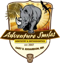 Adventure Smiles logo featuring rhinoceros, dentistry and orthodontics, est. 2007, Gary and Richardson, DVM.