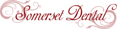 Somerset Dental logo with ornate pink flourishes and elegant script lettering